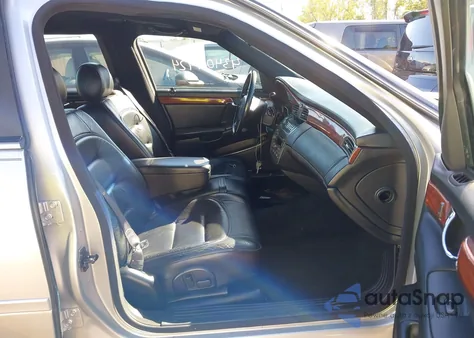 2001 Cadillac Deville Standard z USA, uszkodzony, nr VIN 1GEEH90Y51U550269